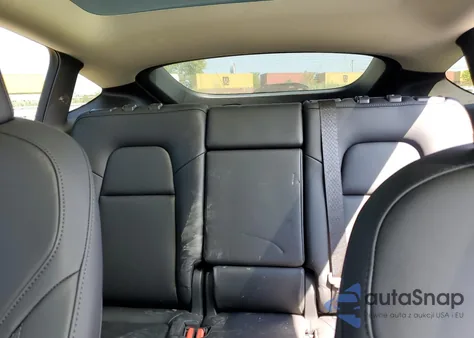 2024 Tesla Model Y из США, поврежденный, VIN 7SAYGAEE1RF185847